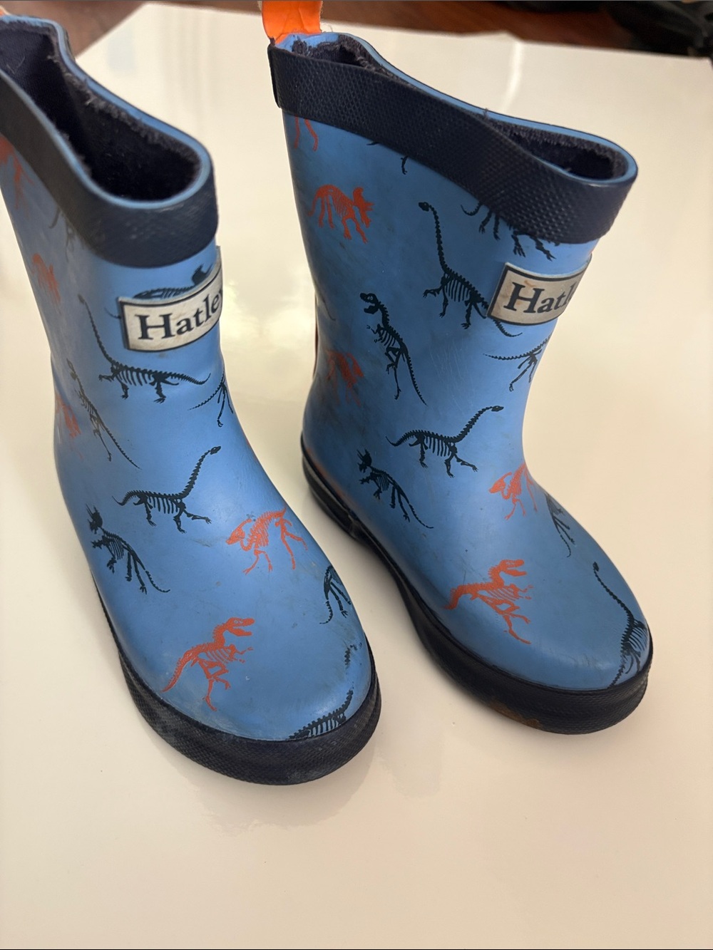 Hatley Blue Kids' Dinosaur Rain Boots size 7 with Orange Accents